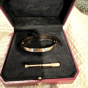 Cartier love rose gold and diamond bracelet. Barely worn.